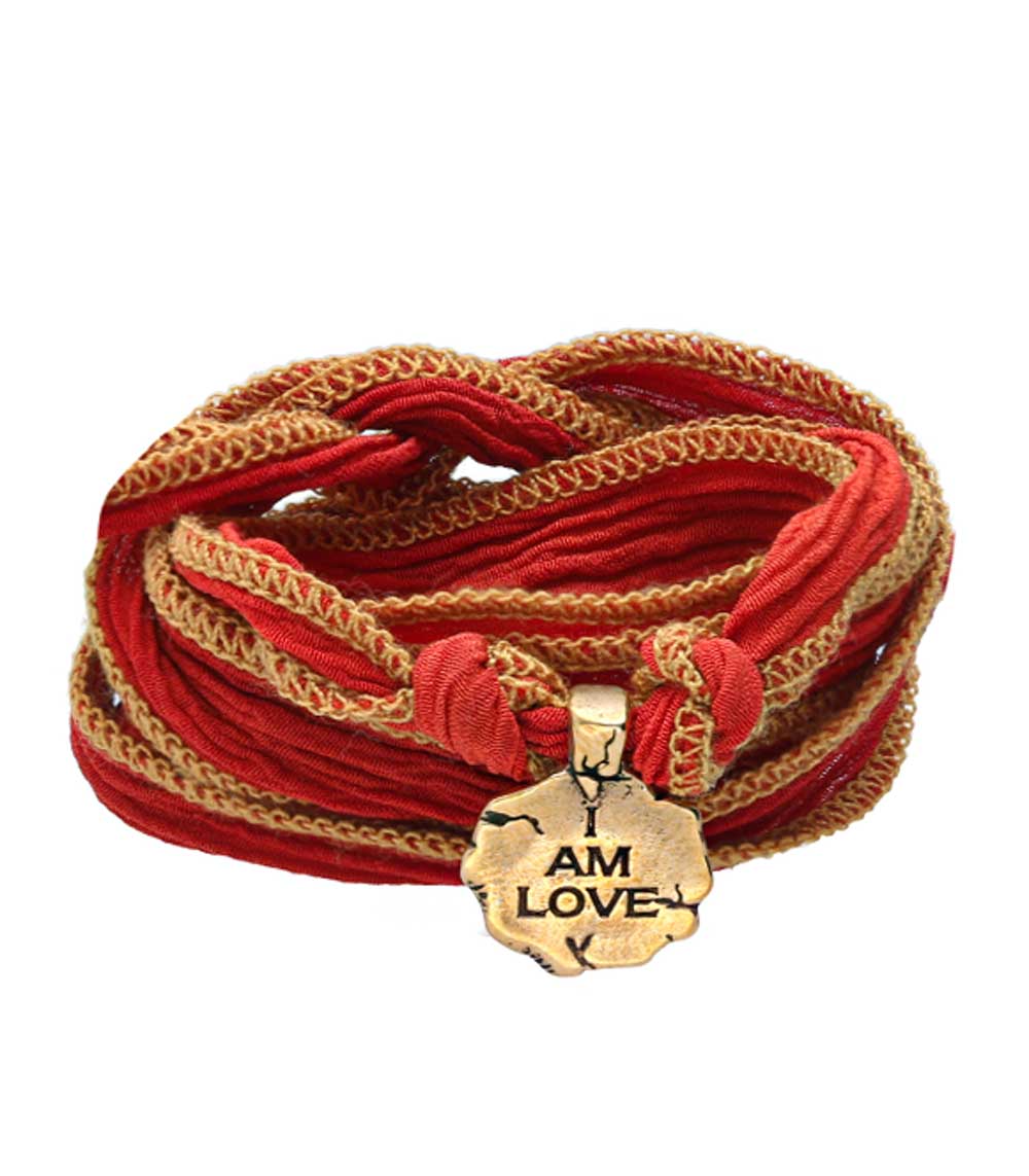 Bracelet en soie à nouer et charm I Am Love en bronze Catherine Michiels