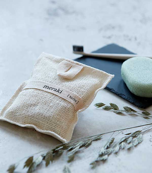 Gant de toilette exfoliant parfumé aux herbes Meraki