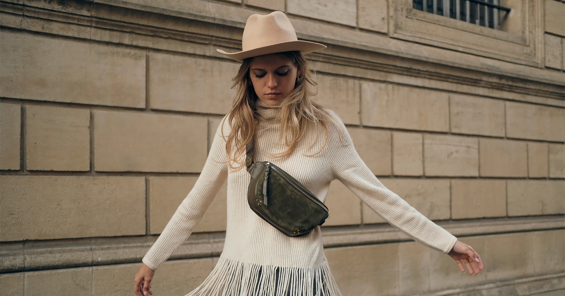 Pull col roulé en cachemire beige